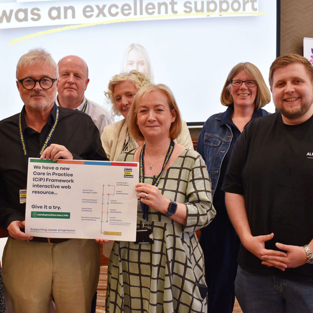 NISCC staff receiving an award for the Care in Practice Framework