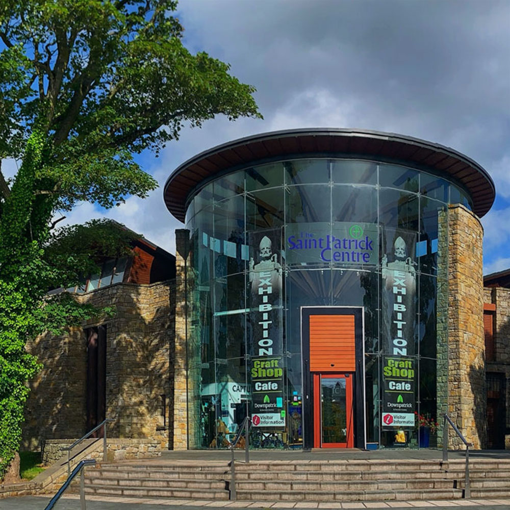 The glass entrance of the Saint Patrick Centre in Downpatrick